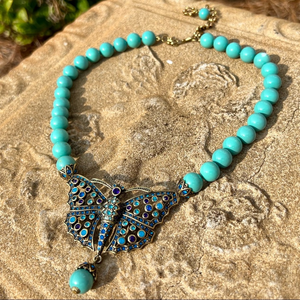 A Turquoise Bead butterfly by Heidi Daus missing